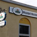 Leuchtkasten und innen beleuchteter Ausleger